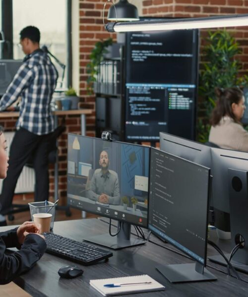 software-company-employee-in-video-call-answering Answering Service for software firm