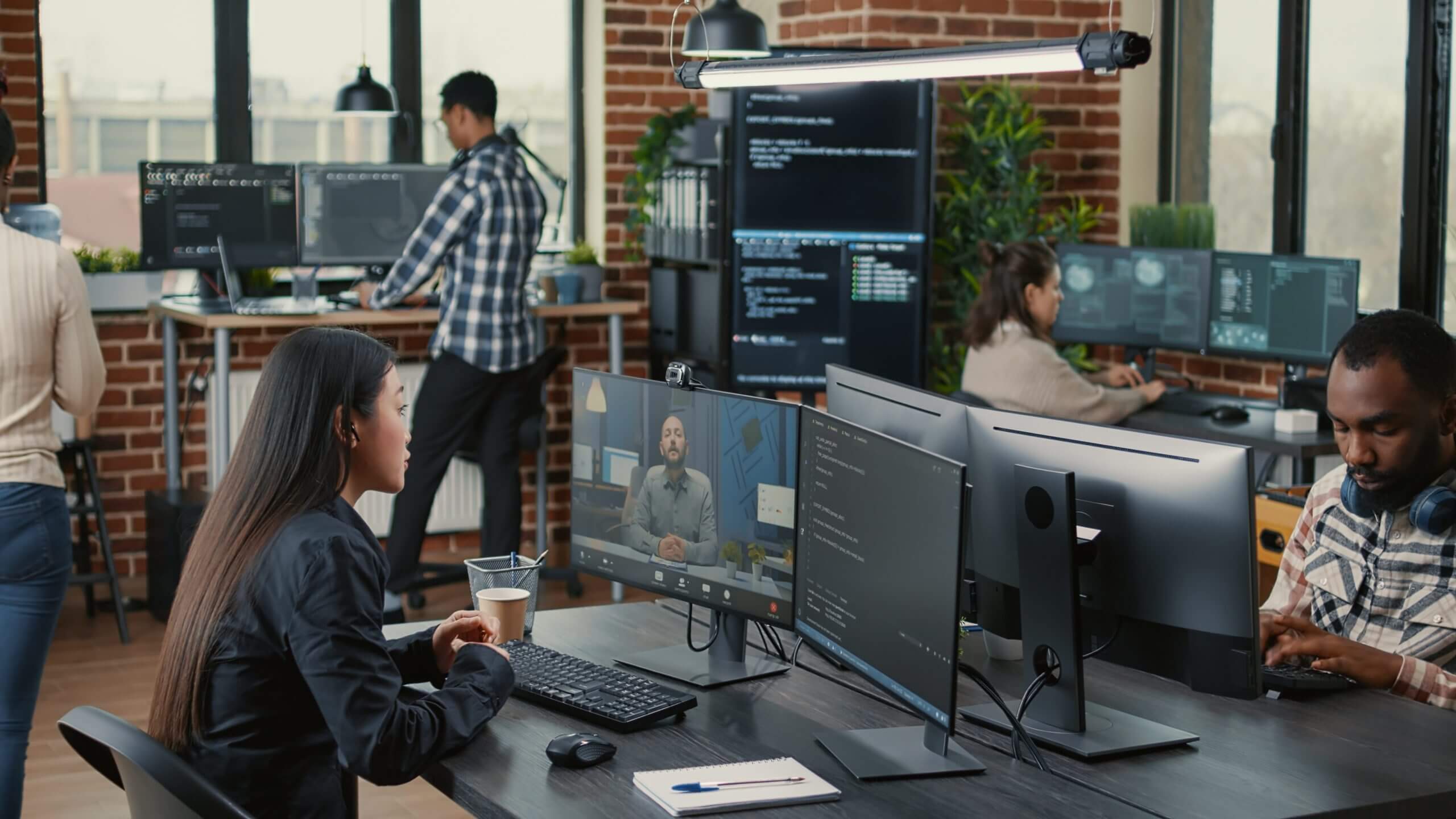 software-company-employee-in-video-call-answering Answering Service for software firm