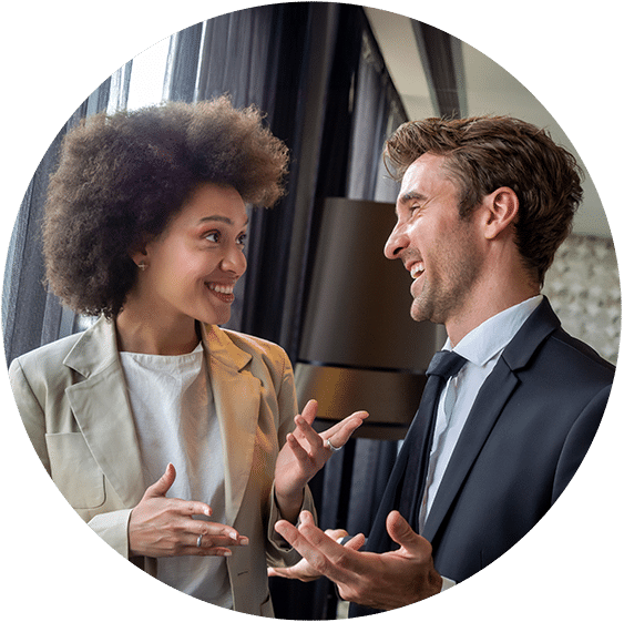 happy-business-colleagues-talking-in-modern-office-2025-03-13-02-11-20-utc copy