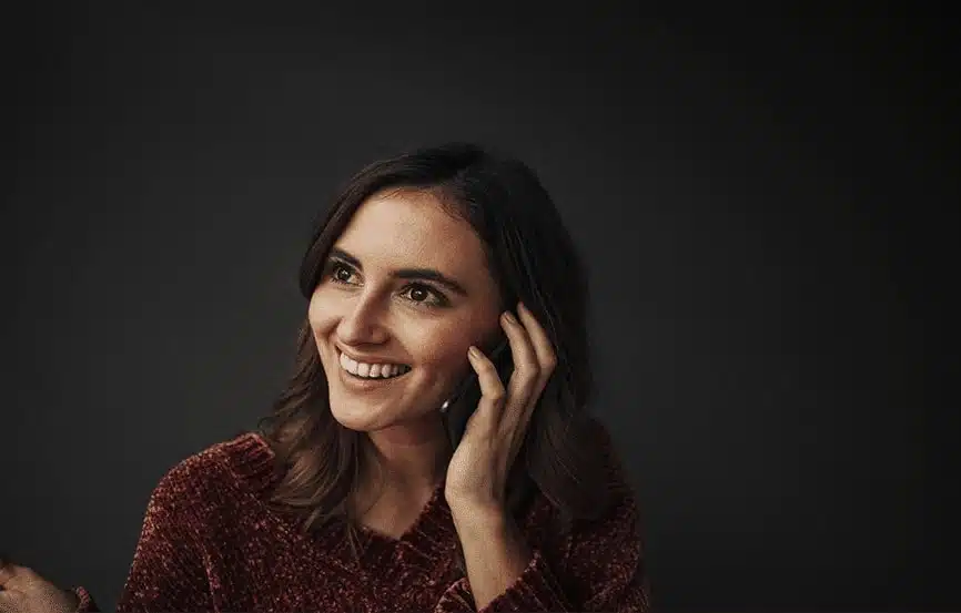 Smiling best virtual receptionist taking calls for business