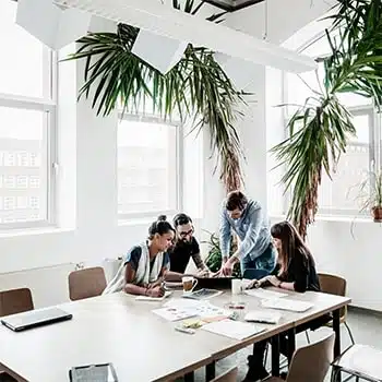 Small business team meeting with 24/7 answering service