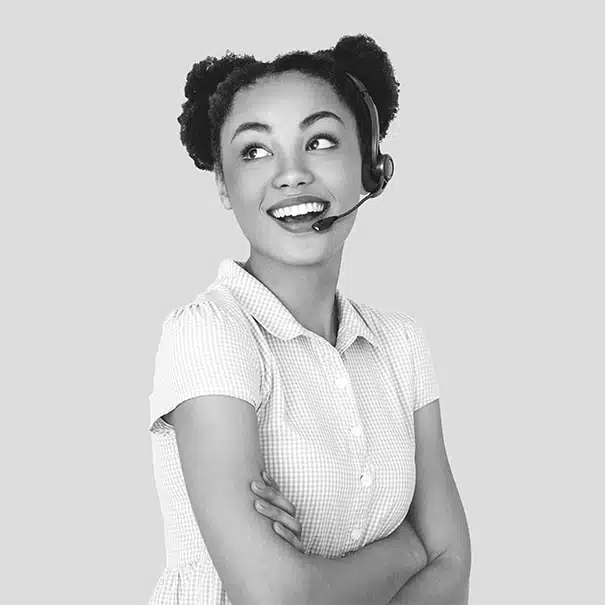 best virtual receptionist standing behind desk smiling