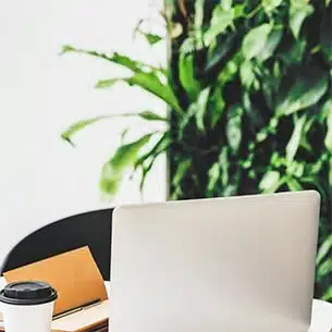 Desk at small business with virtual secretary