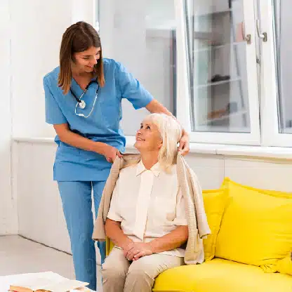 Nurse assists patient with support from an answering service for home health care center ALT