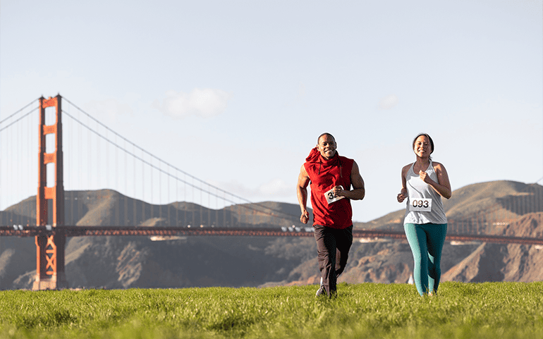 Runners enjoying a jog near Golden Gate Bridge in California