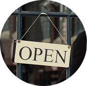 Open sign hanging on a shop door, representing Posh AI for small businesses