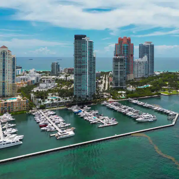 Aerial view of Miami marina and skyline, representing Posh's answering service coverage in Miami