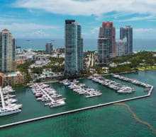 Aerial view of Miami marina and skyline, representing Posh's answering service coverage in Miami